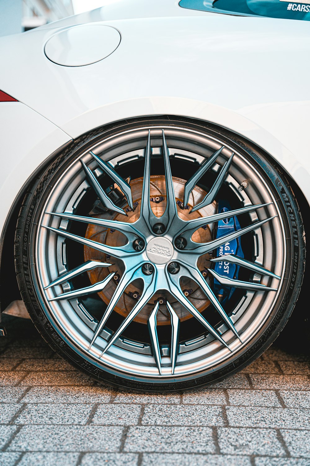 a close up of a wheel on a car