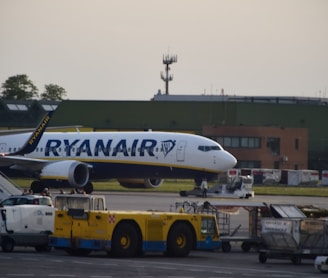 a large jetliner sitting on top of an airport tarmac