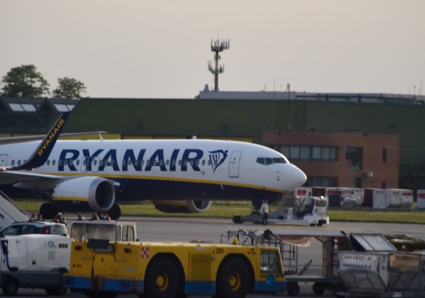 a large jetliner sitting on top of an airport tarmac