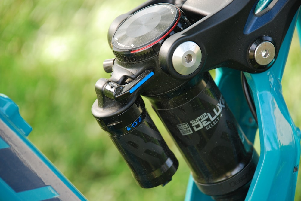 a close up of a bike handle with a light on it