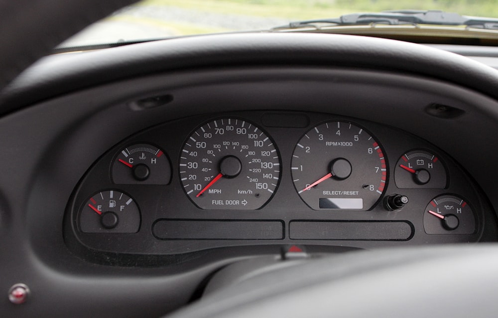 a close up of a speedometer in a car