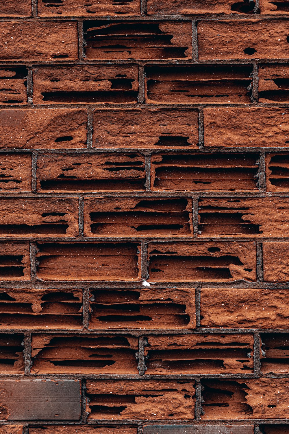 a close up of a brick wall made of bricks