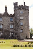 a large castle like building with a clock tower