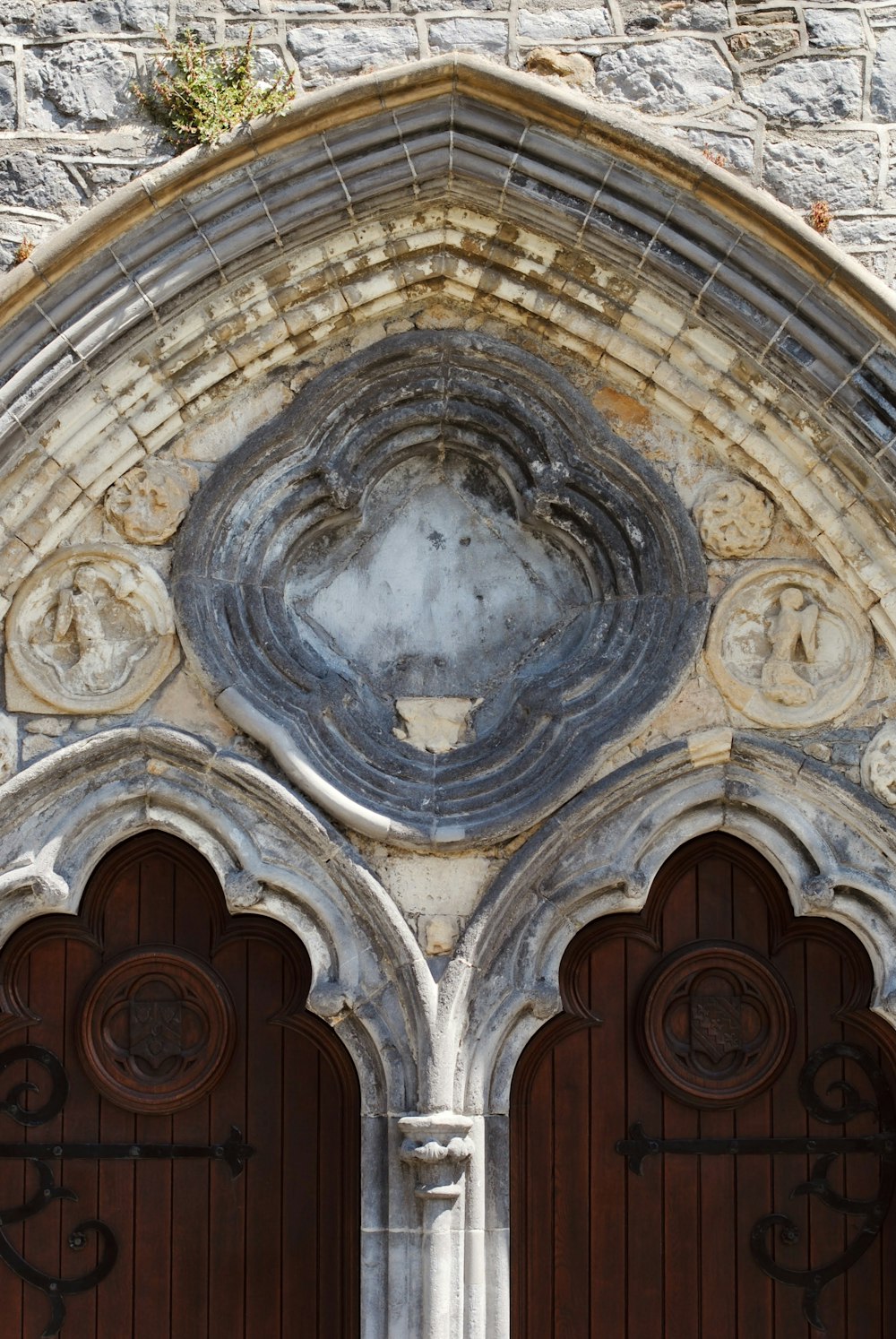 a very old building with two large doors