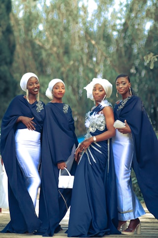a group of women standing next to each other
