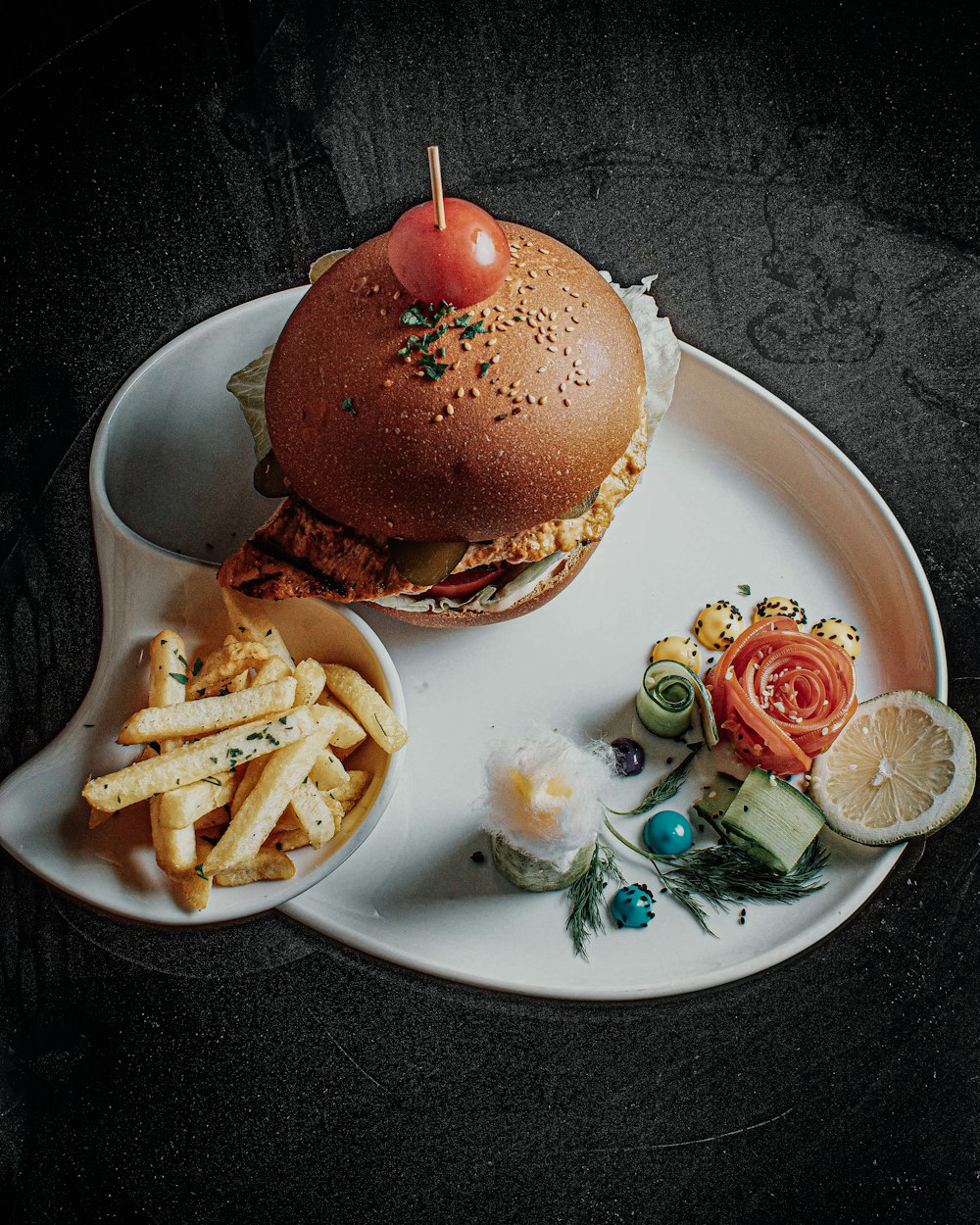 a plate with a sandwich and fries on it