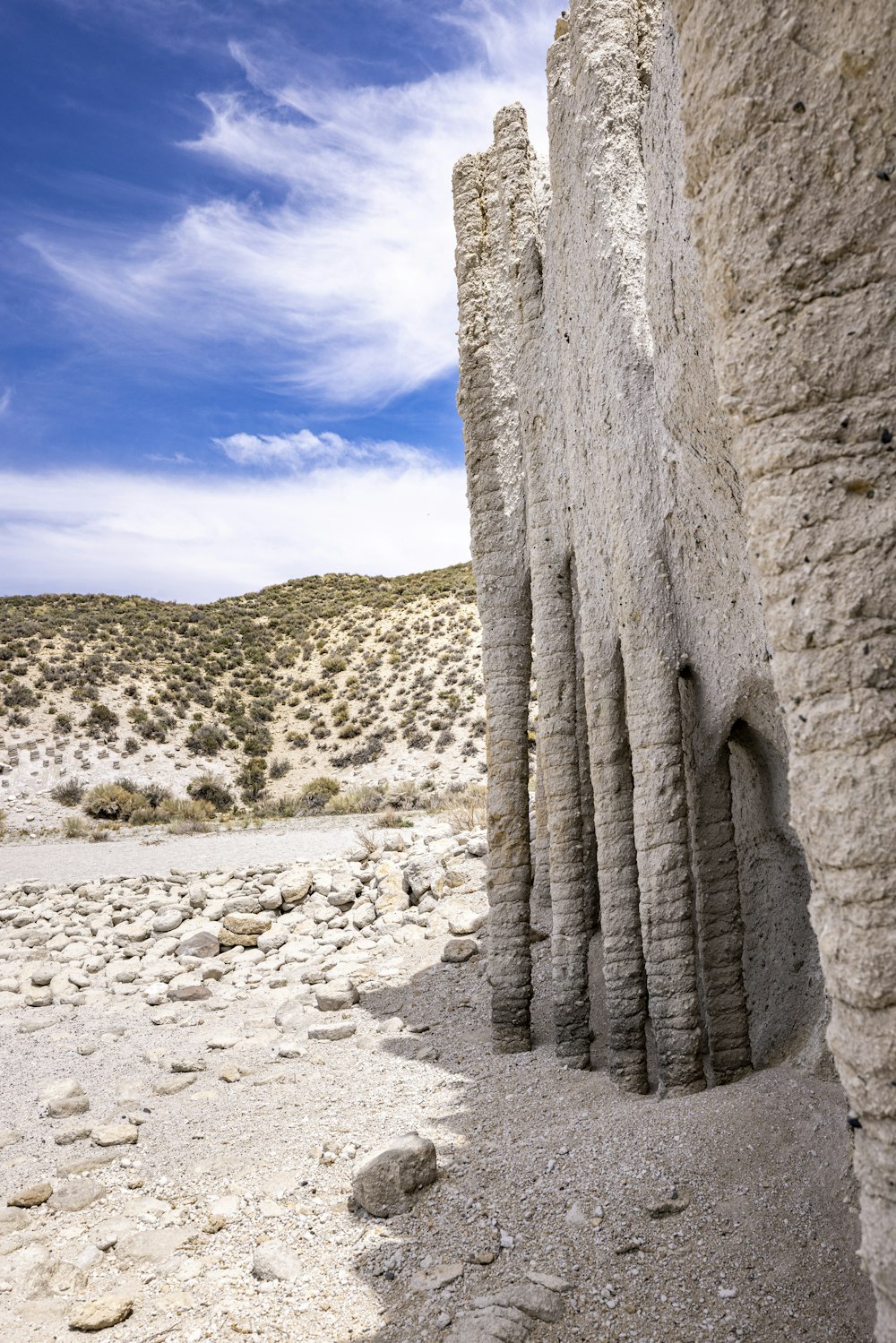 a rock formation in the middle of a desert