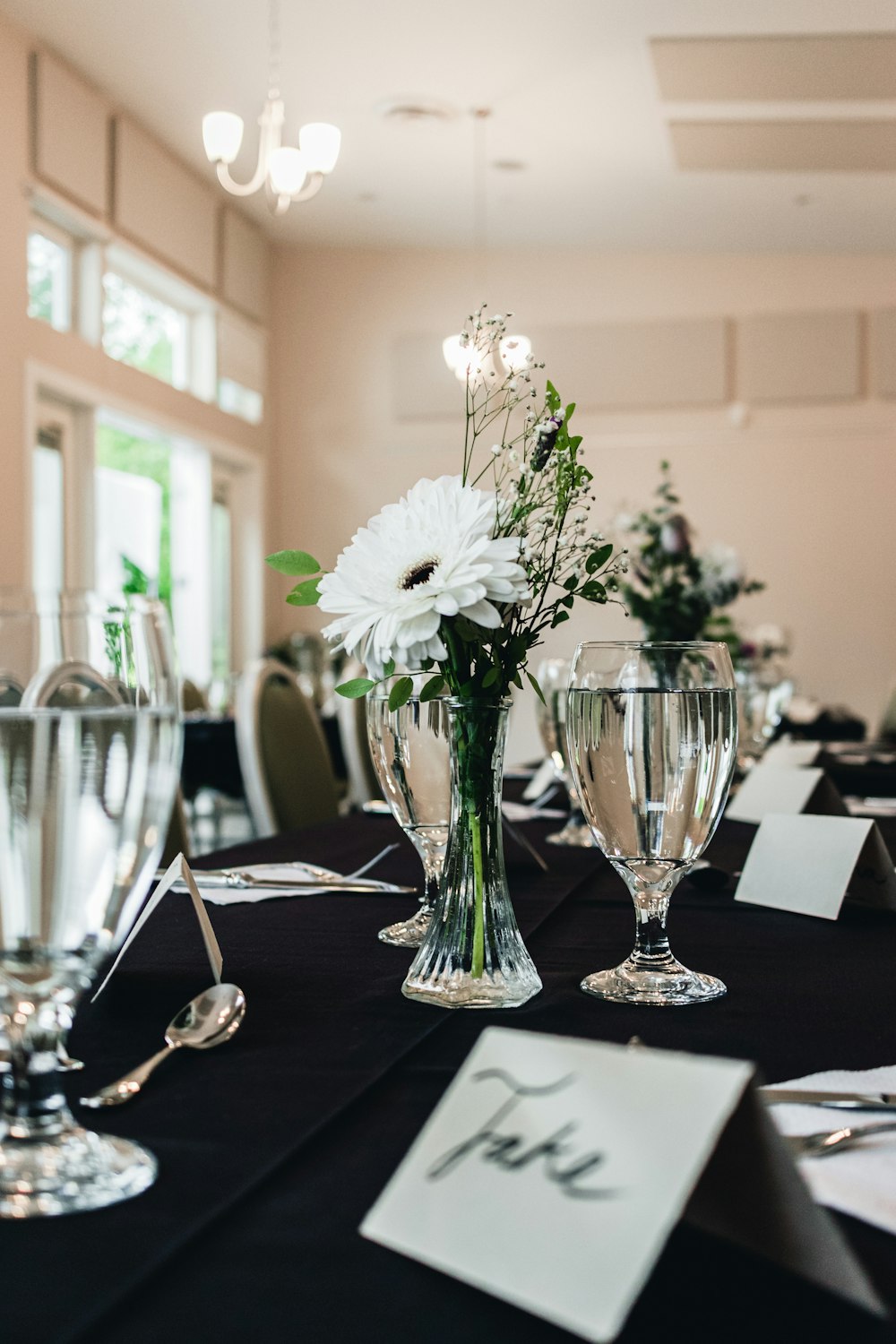 a table with a vase of flowers on it