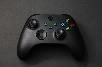a close up of a controller on a table
