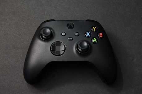 a close up of a controller on a table