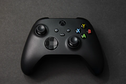 a close up of a controller on a table