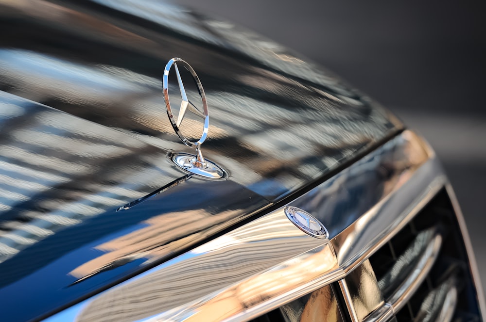a close up of the hood ornament of a car