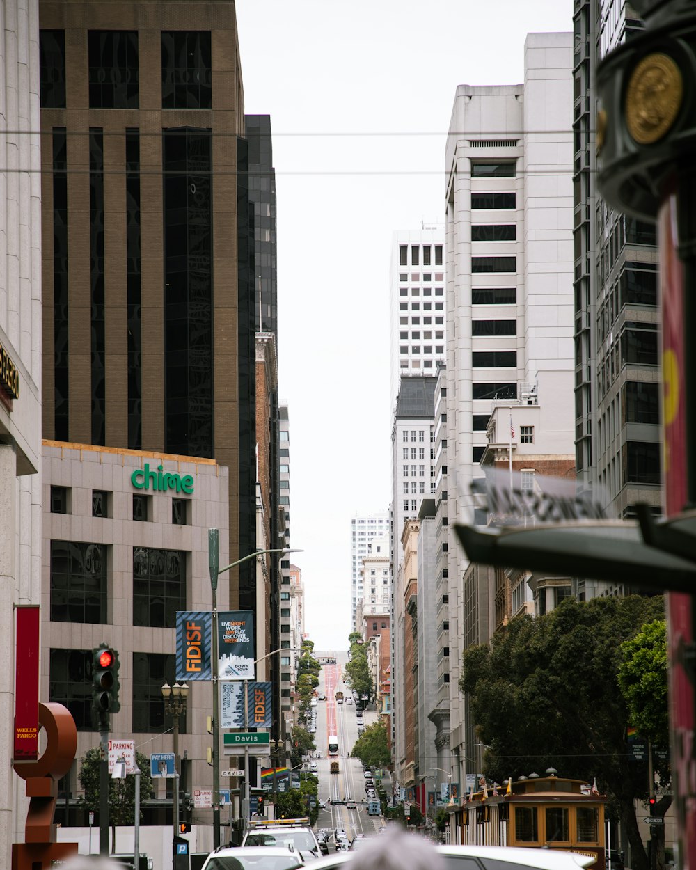 a city street filled with lots of tall buildings