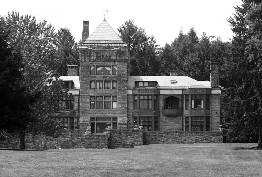 a black and white photo of a large brick building