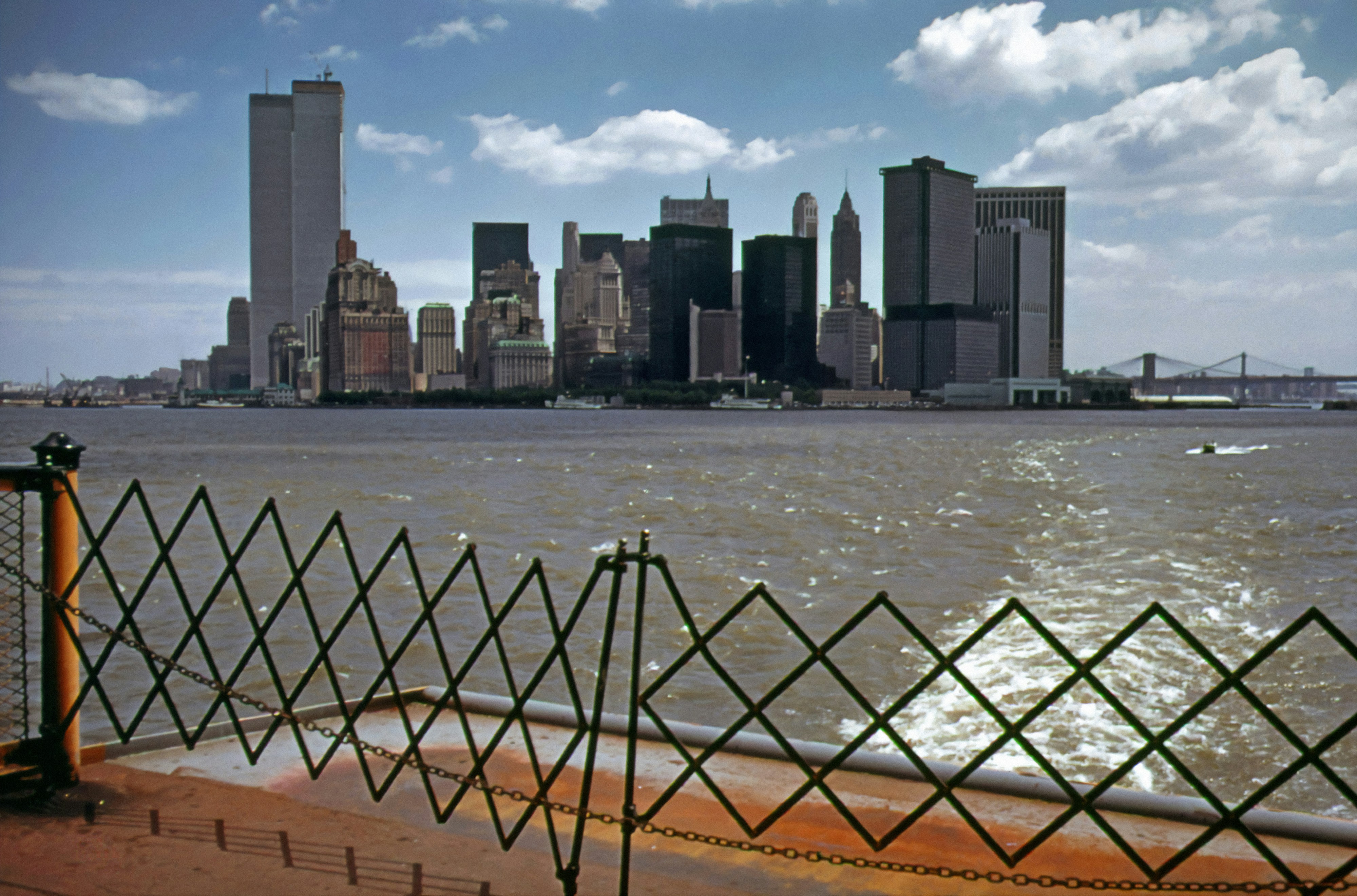 a view of a city from across the water, May 1973: Manhatten skyline from Staten Island Ferry (Arthur Tress / Documerica)