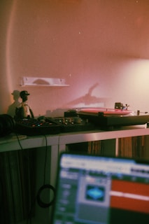 a laptop computer sitting on top of a desk