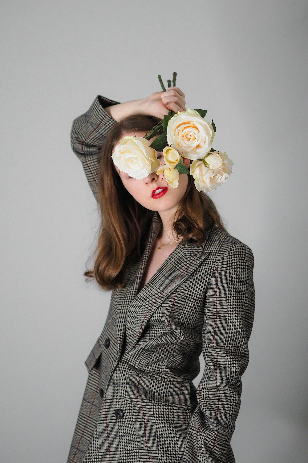 a woman with flowers in her hair