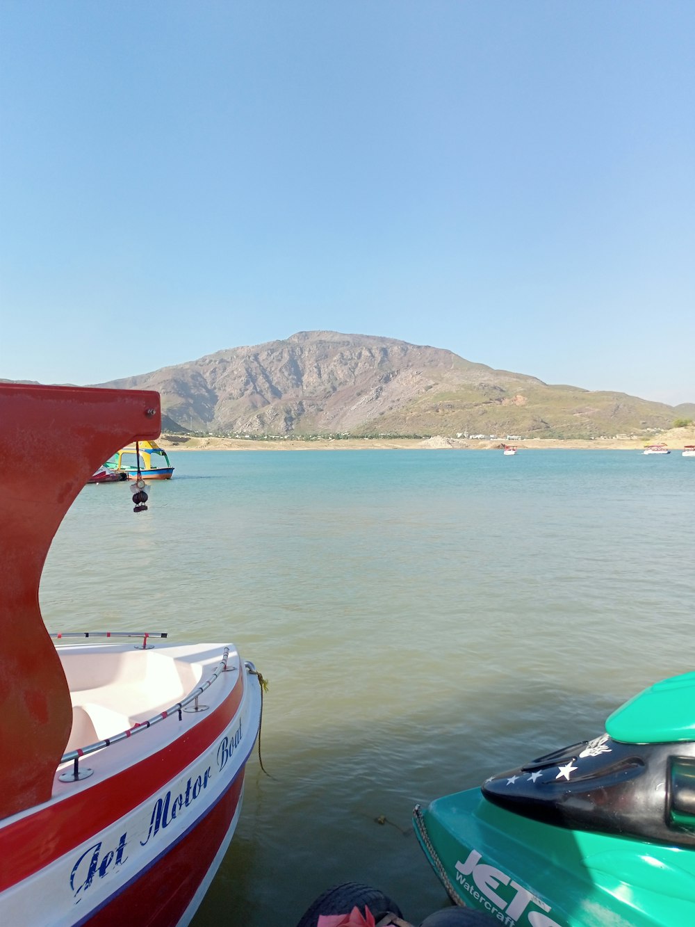 a couple of boats that are sitting in the water