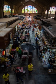 an overhead view of a market with people shopping