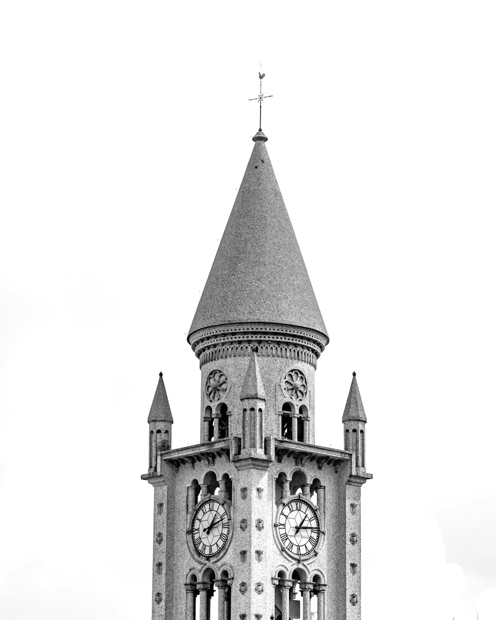 a black and white photo of a clock tower