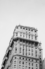 a black and white photo of a tall building