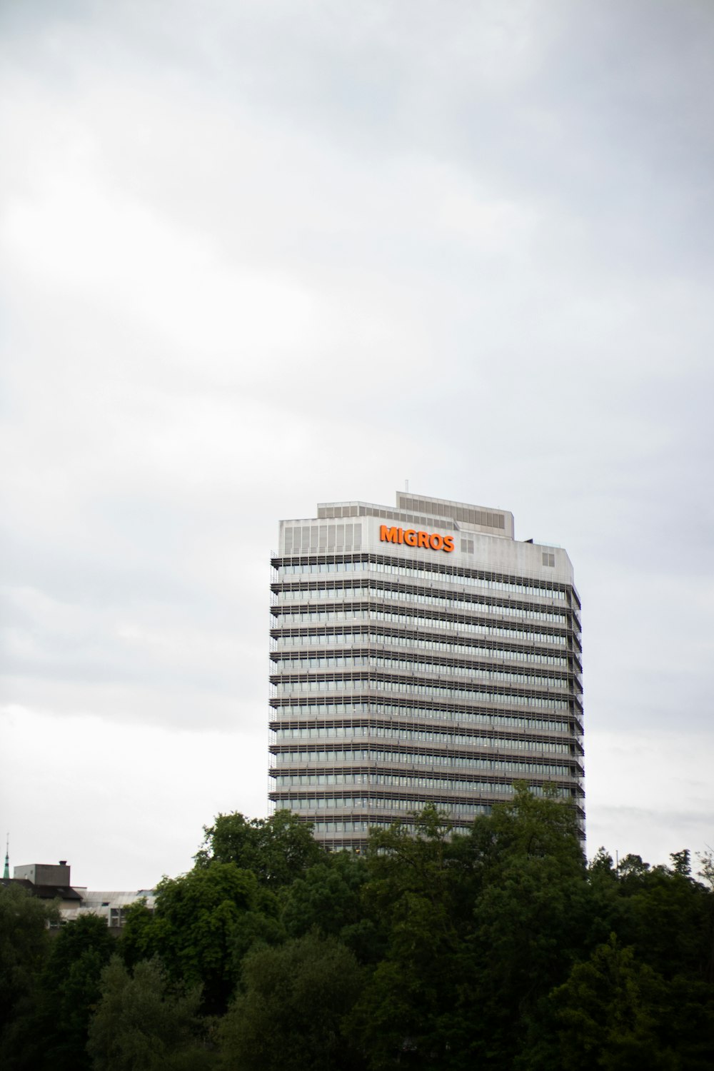 a tall building with a sky background