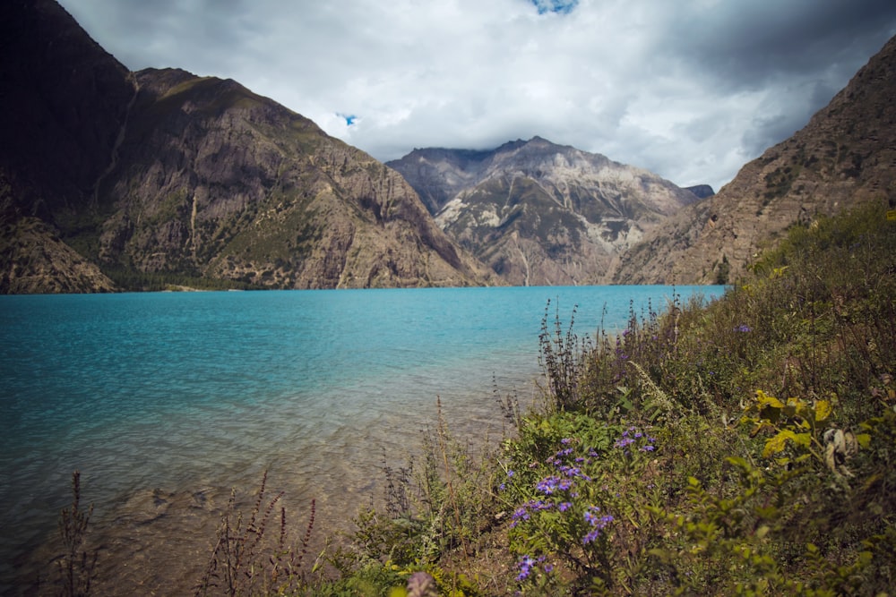 a large body of water surrounded by mountains