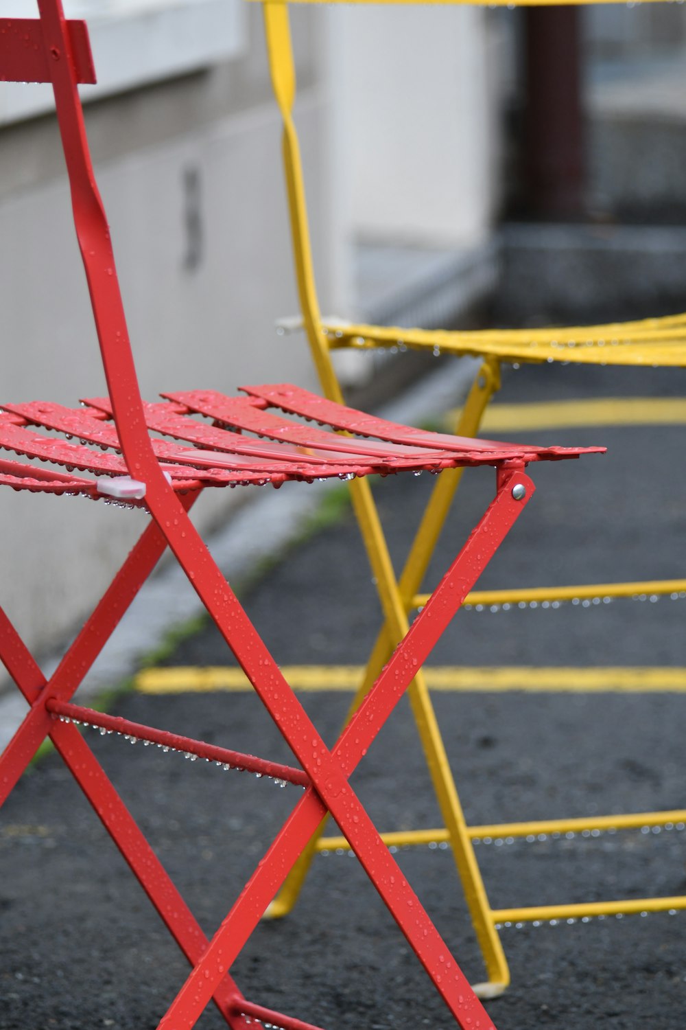 a couple of red chairs sitting next to each other