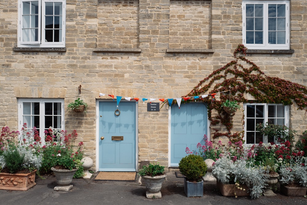 a blue front door of a stone building