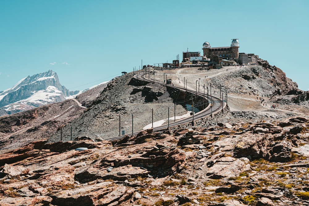 a mountain with a road going up the side of it