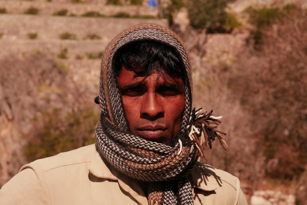 a man with a scarf around his head