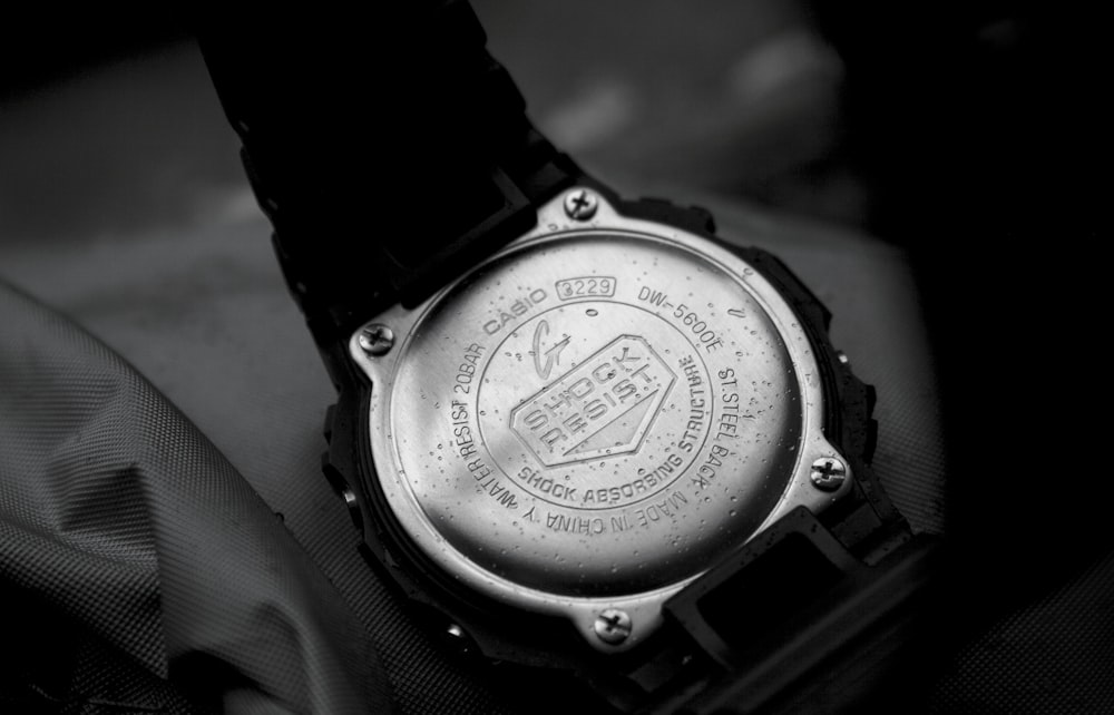 a close up of a watch on a person's wrist