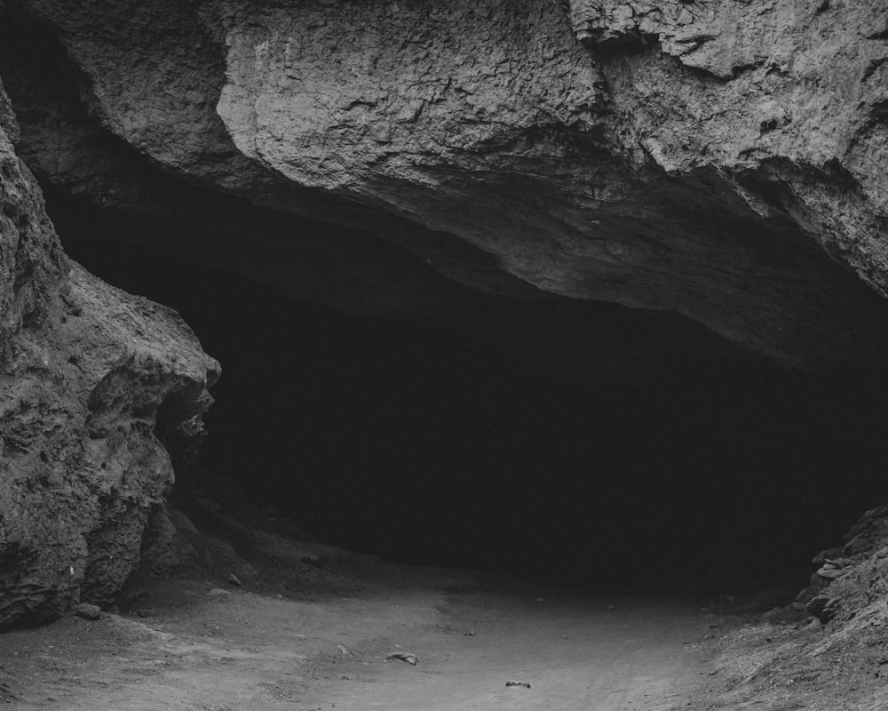 a black and white photo of a cave