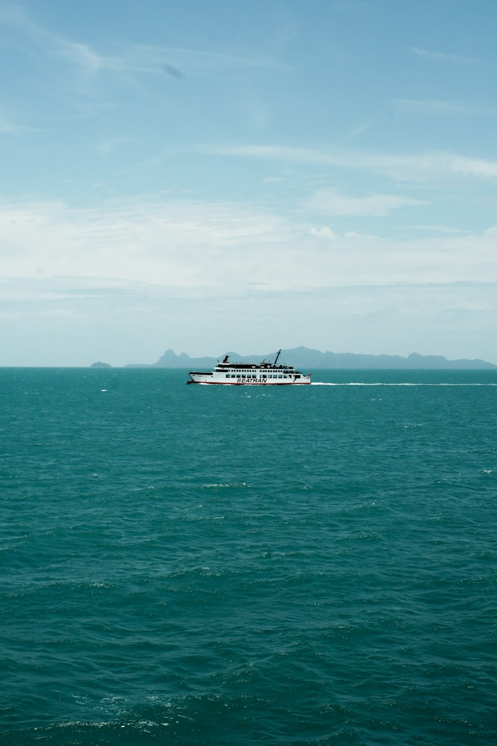 a large boat in the middle of a large body of water