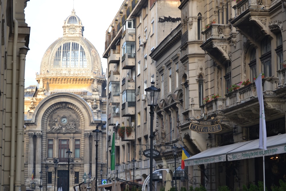 a city street filled with lots of tall buildings