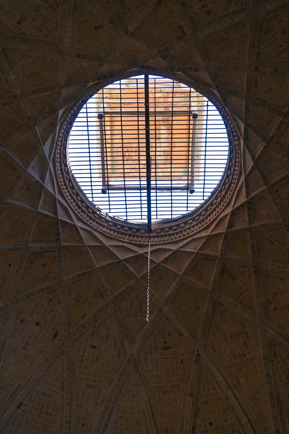 a round window in the ceiling of a building