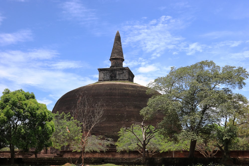 a large building with a spire on top of it