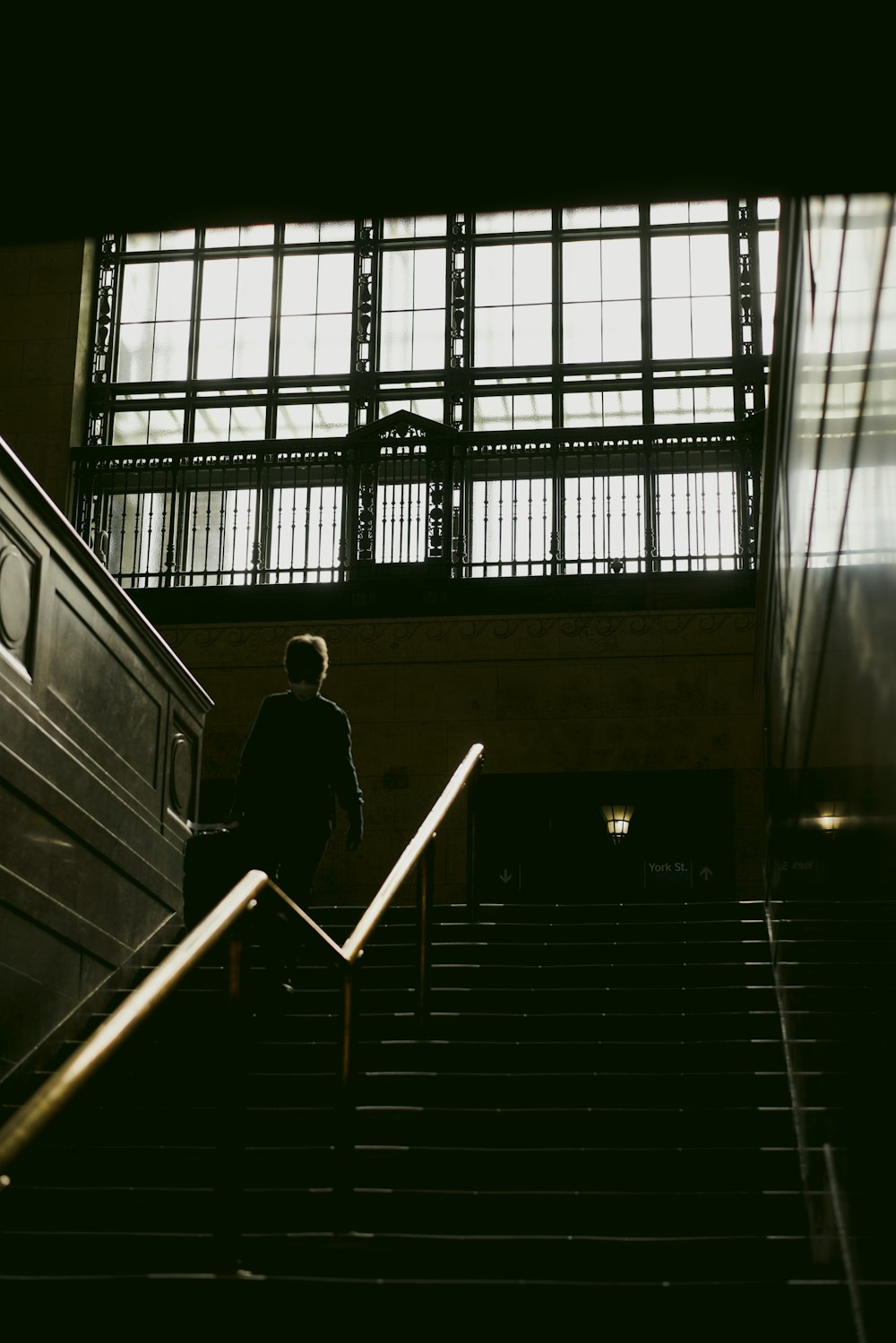 a man walking down a flight of stairs