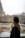 a woman standing in front of the eiffel tower