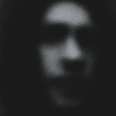 An old photograph of a secret meeting, blurred and grainy.