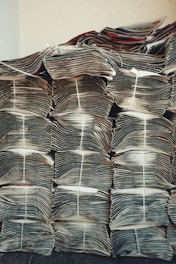 stacks of papers stacked on top of each other