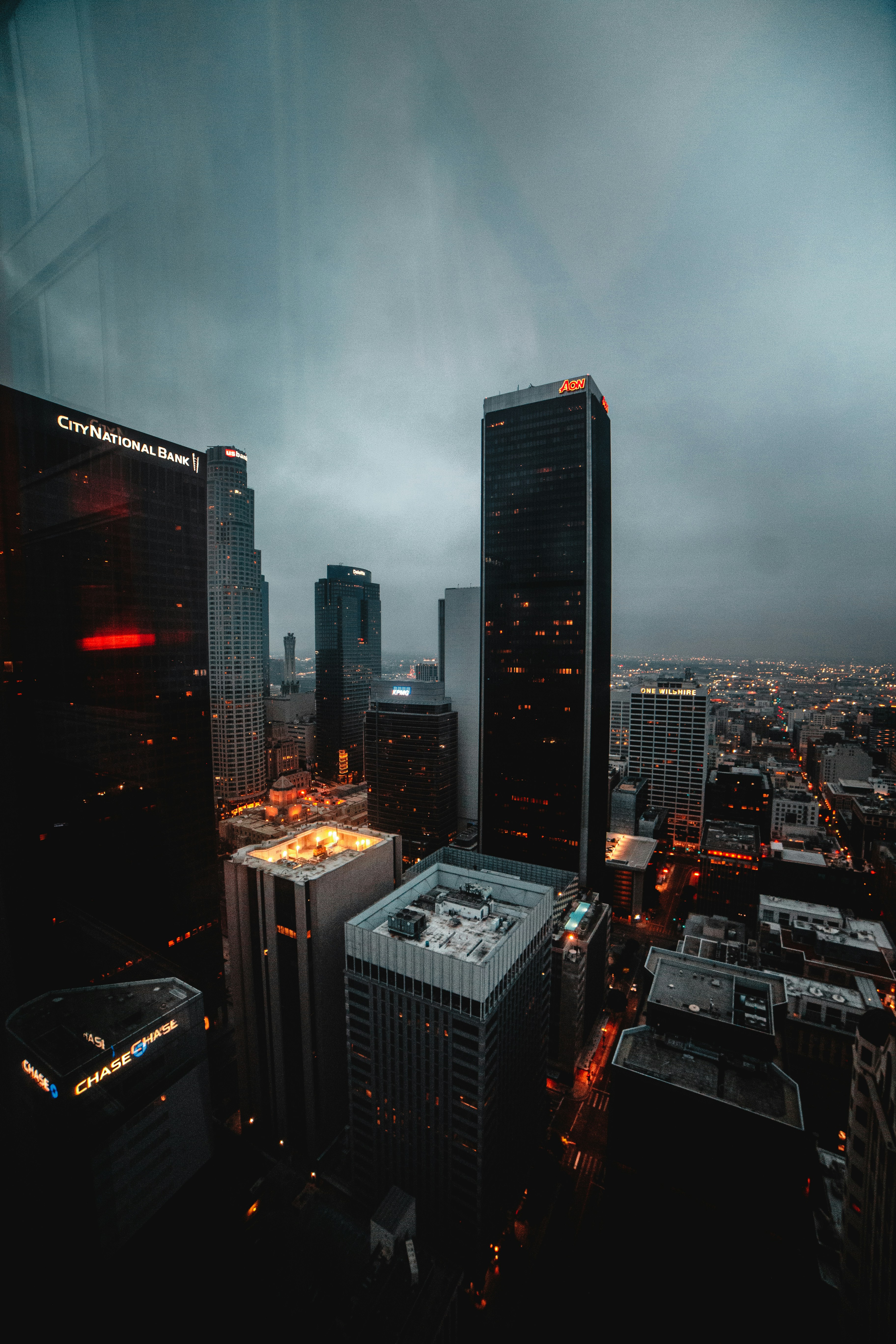 a view of a city at night from the top of a building