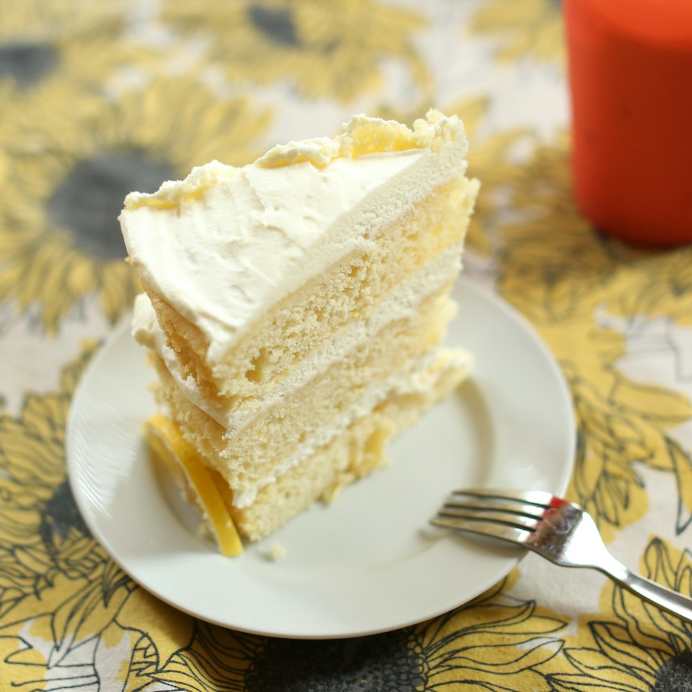 a piece of cake on a plate with a fork