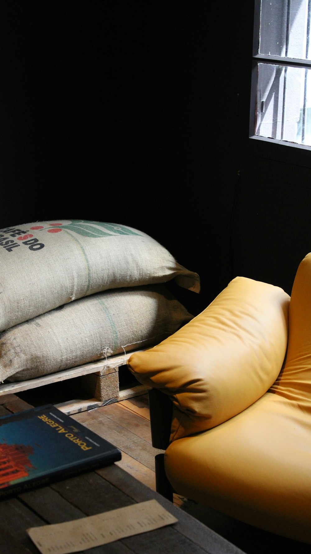 a pair of yellow chairs sitting next to each other