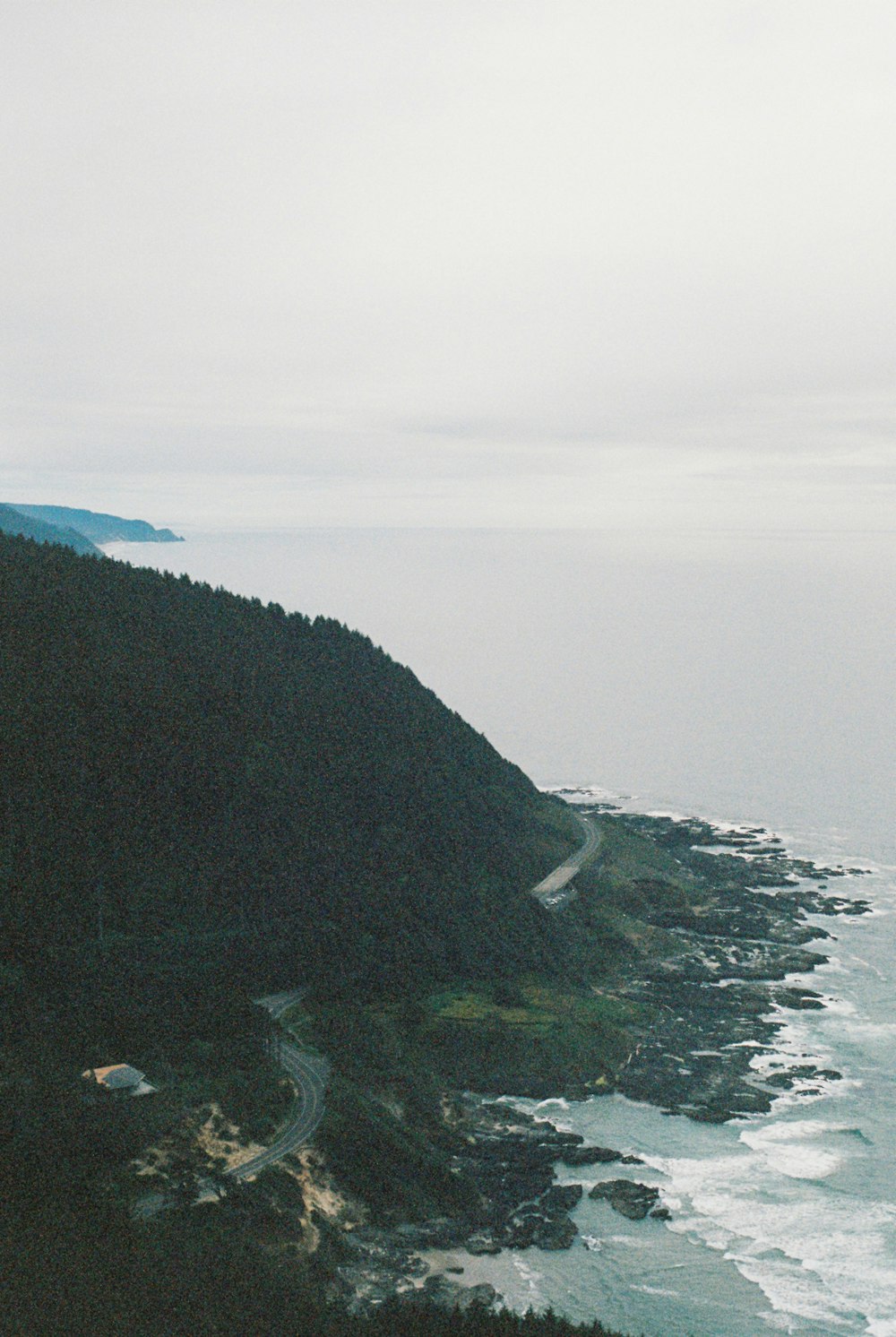 a scenic view of the ocean from a hill