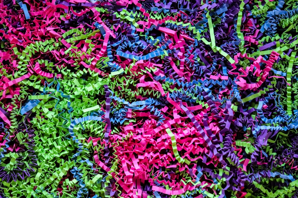 a large pile of colorful shredded paper