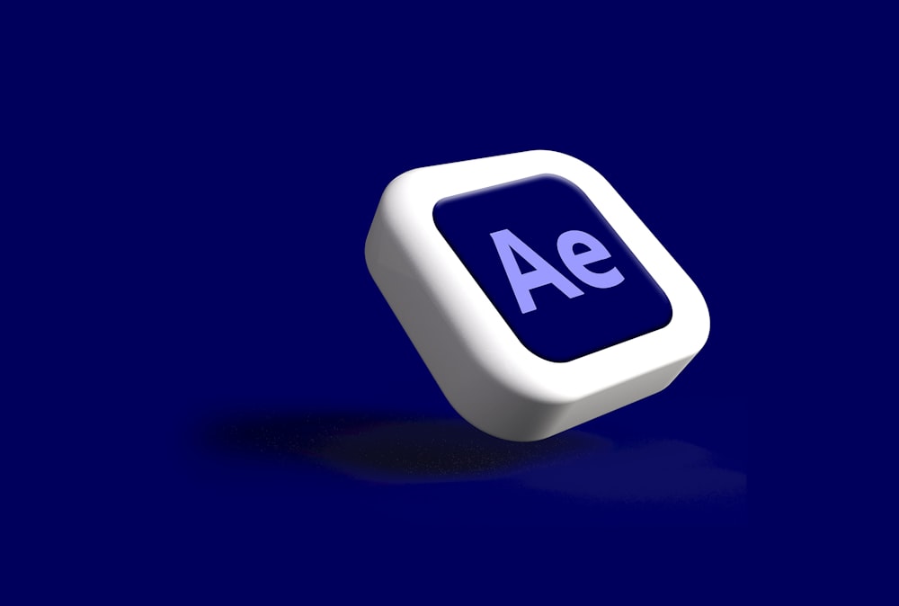 a white and blue object with the word ae on it
