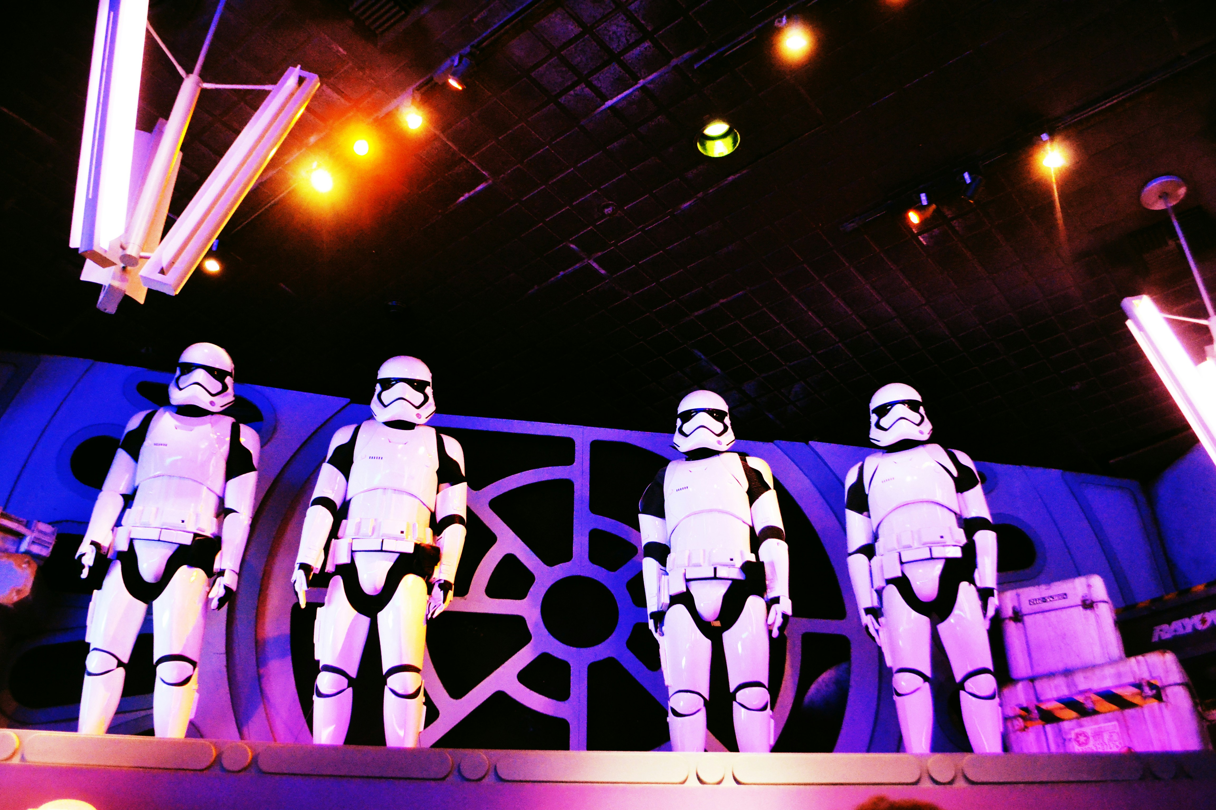 a group of star wars action figures on display