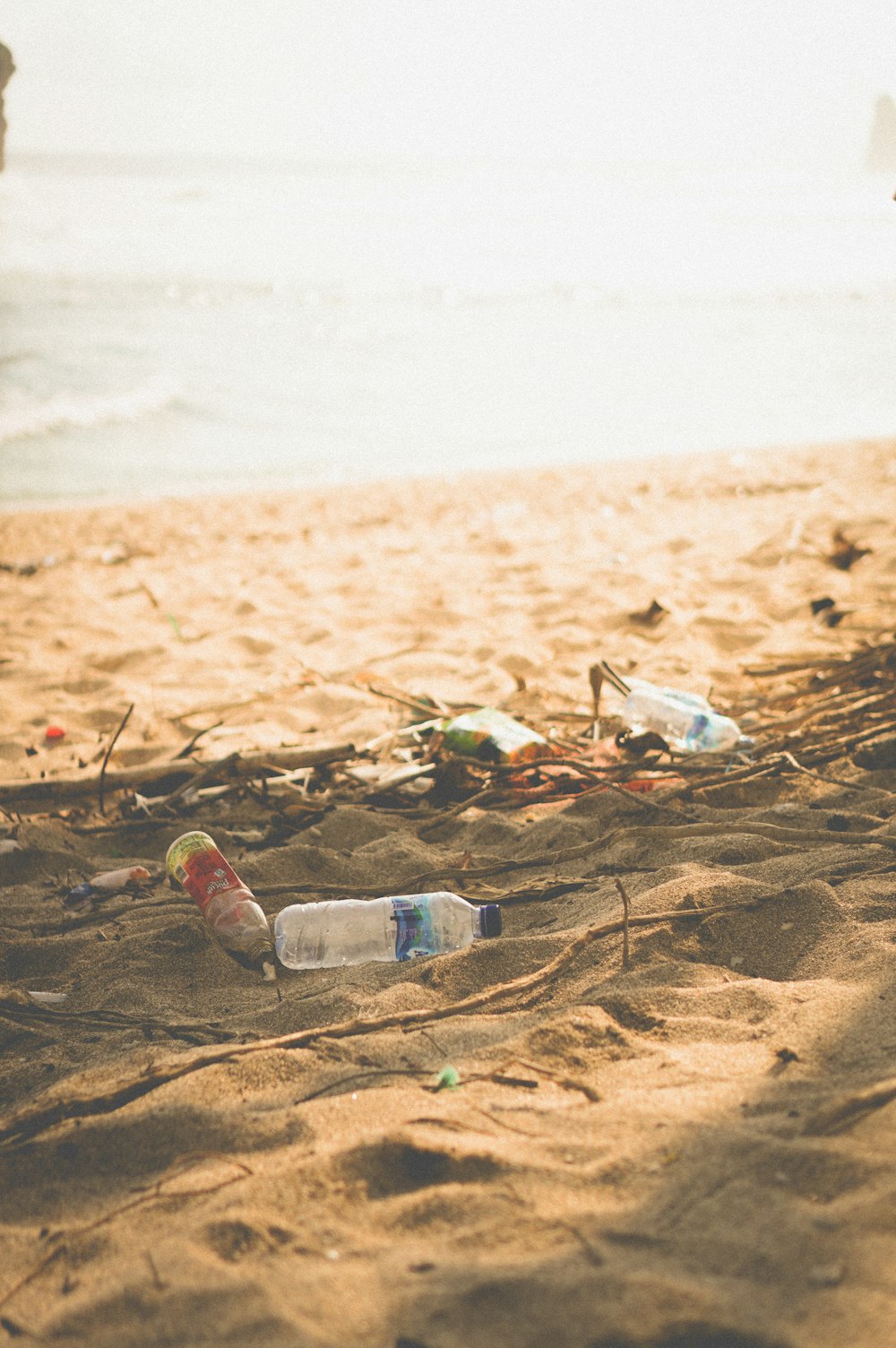 a beach with a lot of trash on it