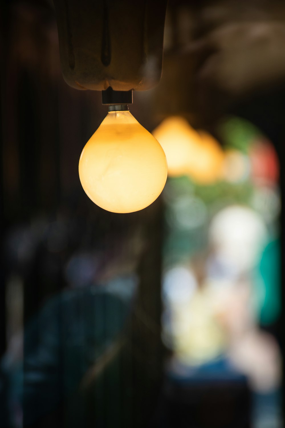 a close up of a light bulb with a blurry background